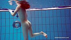 blue bikini hugs martina's tight pussy underwater suggestively