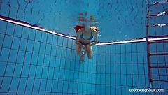 blue bikini hugs martina's tight pussy underwater suggestively