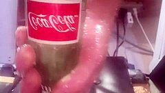 A big bottle was inserted into the tight ass hole