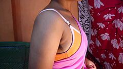 Desi bhabhi's seductive pink saree reveals enticing curves