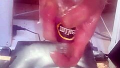 A big bottle was inserted into the tight ass hole