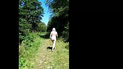 Naughty housewife dares a naked public walk