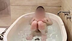 The bathing of a Japanese college girl in the bathroom