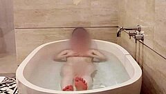 The bathing of a Japanese college girl in the bathroom