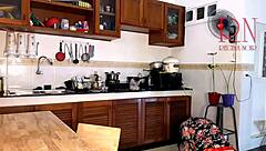 Housewife in pantyhose gets naked maid to orgasm in the kitchen