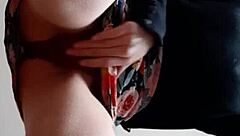 A brunette girl gets a portion of cum on her face