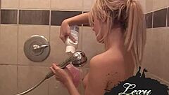 Lexy lohan with natural tits takes a shower and rubs her pussy