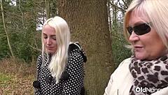 Blonde woman with big tits fucks with a mature MILF in lesbo sex
