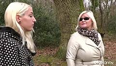 Blonde woman with big tits fucks with a mature MILF in lesbo sex
