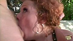Redhead Slut Fucks Outdoors In Threesome