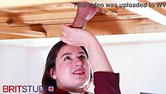 Uniformed brunette milks more than milk at the desk