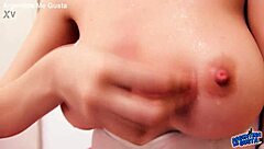 Busty skinny brunette shows off her round ass in panties.