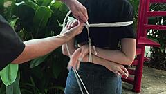 blonde teen beauty gets tangled up in park bondage