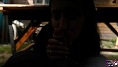Housewife gives sloppy blowjob under table in backyard pov