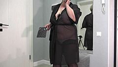 A curvy milf tries on a new bodysuit