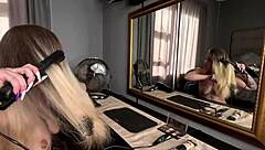 Sexy Tattooed Blonde Girl Does Hair and Makeup Naked in Homemade Video