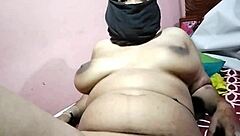 An Indian girl has sex with her boyfriend at home, showcasing raw passion