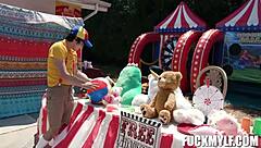 ricky faces intense wrestling with bella in carnival adventure