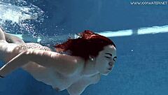 diana rius with hot tits touches her body underwater?