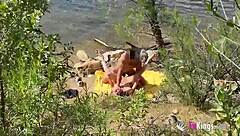 A girl had outdoor fun with a guy by the lake and got intimate with him