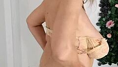 Granny's juicy tits arouse; she fingers and masturbates