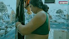 naughty young man gets intimate with older woman in bathroom