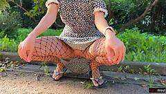 Teen 18+ flashes ass plug in fishnet pantyhose publicly