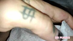 Ebony gives handjob to big black cock during massage masturbation.