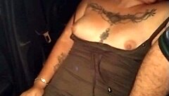 A sexy latina gets groped in an uber ride outdoors.