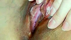 Horny Japanese slut rubs her wet cunt close up