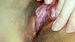 Horny Japanese slut rubs her wet cunt close up