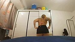 Exhibitionist in short skirt flashes and masturbates solo outdoors.