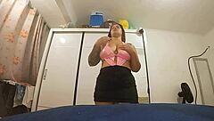 Exhibitionist in short skirt flashes and masturbates solo outdoors.