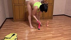 brunette gymnast gapes anus with anal toy