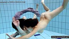 shaved brunette big tits underwater