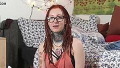 redhead with glasses masturbates to orgasm