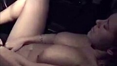 Busty milf fingering herself in car outdoors