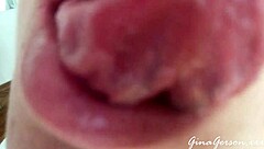 Young blonde amateur performs tongue saliva throat fetish