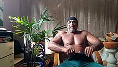 Brazilian bear Kojac solo masturbates his tattooed hairy monster cock