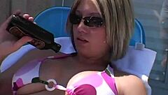 Paige Lotions Up Her Body Outdoors Under The Sunshine Intensely