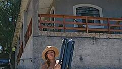 setting up tent in countryside with exhibitionist body in ass