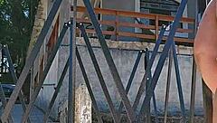 setting up tent in countryside with exhibitionist body in ass