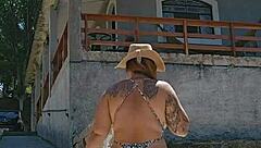 setting up tent in countryside with exhibitionist body in ass