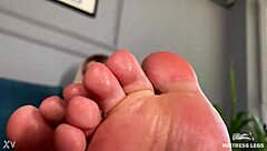 goddess with pink oily soles and toes teases you closeup