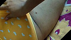 Wife in period rests while cuckold hubby films her sleeping form!