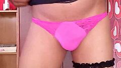 Watch me dancing sexy in this shiny pink thong - oh yeah!