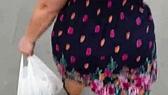 hey, check out this chubby milf flashing her ass outdoors in lingerie