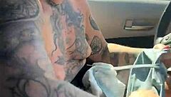 just a girl trying to adjust her sports bra in the gym parking lot before workout