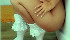 Innocent blonde teen tempted to finger shaved pussy until wet orgasm solo.