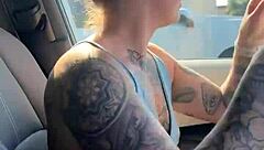 just a girl trying to adjust her sports bra in the gym parking lot before workout